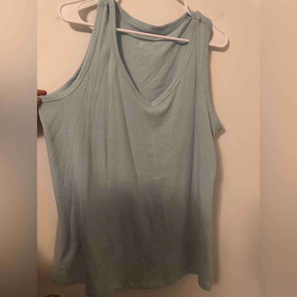 size xl just be tank top, very loose and comfortable. Only worn two times.